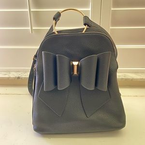 Black bow backpack